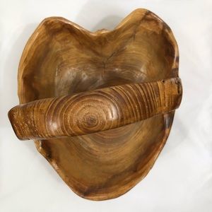 Used heart shaped wood bowl with handle. The heart is not a perfect shaped heart